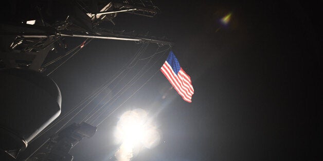 MEDITERRANEAN SEA - APRIL 7: In this handout provided by the U.S. Navy,The guided-missile destroyer USS Porter fires a Tomahawk land attack missile on April 7, 2017 in the Mediterranean Sea. The USS Porter was one of two destroyers that fired a total of 59 cruise missiles at a Syrian military airfield in retaliation for a chemical attack that killed scores of civilians this week. The attack was the first direct U.S. assault on Syria and the government of President Bashar al-Assad in the six-year war there. (Photo by Ford Williams/U.S. Navy via Getty Images)