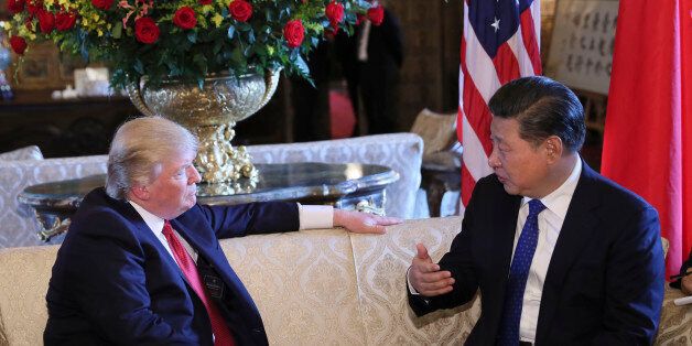PALM BEACH, April 6, 2017 -- Chinese President Xi Jinping (R) meets with his U.S. counterpart Donald Trump in the latter's Florida resort of Mar-a-Lago in the United States, April 6, 2017. (Xinhua/Lan Hongguang via Getty Images)