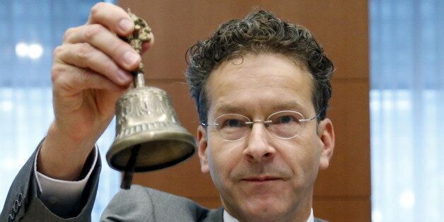 Eurogroup President Jeroen Dijsselbloem rings the bell at the start of a euro zone finance ministers meeting in Brussels, Belgium, July 13, 2015. Euro zone leaders made Greece surrender much of its sovereignty to outside supervision on Monday in return for agreeing to talks on an 86 billion euros bailout to keep the near-bankrupt country in the single currency. REUTERS/Francois Lenoir TPX IMAGES OF THE DAY