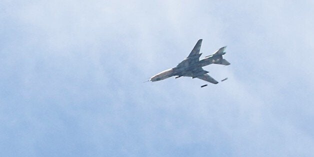 DAMASCUS, SYRIA - MARCH 20: A fighter jet of Assad regime force airstrikes in Jobar district of Damascus, Syria on March 20, 2017. Air crafts bombardments continue in the area as opposition forces clash with Assad regime forces. (Photo by Diaa al Din/Anadolu Agency/Getty Images)