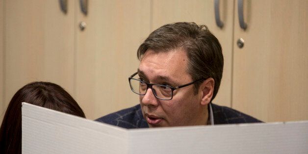 Presidential candidate and Serbian Prime Minister Aleksandar Vucic (C) casts his ballot at a polling station in Belgrade on April 2, 2017.Serbians head to the polls to elect a new president, with strongman Aleksandar Vucic hoping to tighten his grip on power amid opposition accusations he is shifting the country to authoritarian rule. / AFP PHOTO / OLIVER BUNIC (Photo credit should read OLIVER BUNIC/AFP/Getty Images)