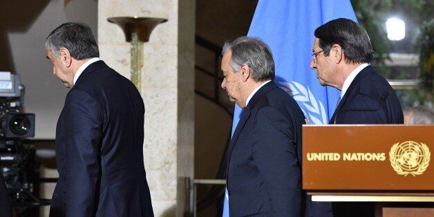 GENEVA, SWITZERLAND - JANUARY 12: Secretary General of the United Nations (UN) Antonio Guterres (C), Turkish Cypriot leader Mustafa Akinci (L) and Greek Cypriot leader Nicos Anastasiades (R) leave after a press conference during the fourth day of Cyprus talks at United Nations Office in Geneva, Switzerland on January 12, 2017. (Photo by Mustafa Yalcin/Anadolu Agency/Getty Images)