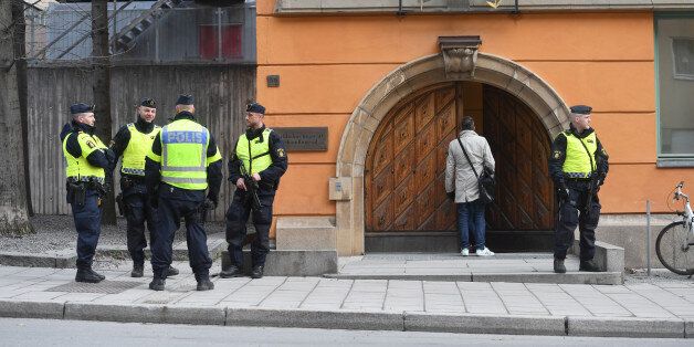 Police officers stand outside the Stockholm District Court as Uzbek national Rakhmat Akilov, prime suspect in Friday's truck attack, appears in court, in Stockholm, Sweden April 11, 2017. TT News Agency/Fredrik Sandberg via REUTERS ATTENTION EDITORS - THIS IMAGE WAS PROVIDED BY A THIRD PARTY. FOR EDITORIAL USE ONLY. SWEDEN OUT. NO COMMERCIAL OR EDITORIAL SALES IN SWEDEN. NO COMMERCIAL SALES.