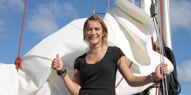 Arrival of 16-year-old, Dutch girl, Laura Dekker in St.Maarten Yacht Club, in the Dutch Caribbean island of Sint Maarten on January 21, 2012. She becomes the youngest sailor who ever sailed around the world solo. AFP PHOTO / JEAN-MICHEL ANDRE (Photo credit should read JEAN-MICHEL ANDRE/AFP/Getty Images)