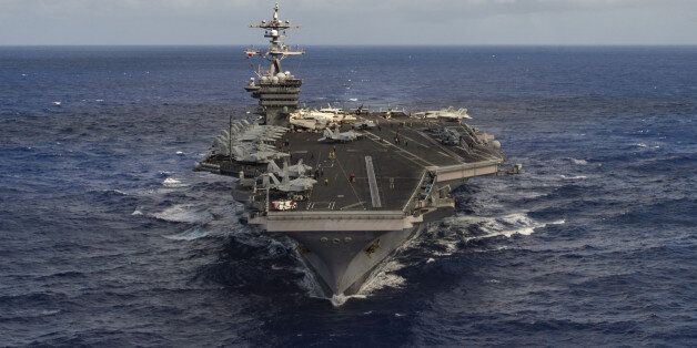 The aircraft carrier USS Carl Vinson (CVN 70) transits the Pacific Ocean January 30, 2017. U.S. Navy Photo by Mass Communication Specialist 3rd Class Tom Tonthat/Handout via Reuters ATTENTION EDITORS - THIS IMAGE WAS PROVIDED BY A THIRD PARTY. EDITORIAL USE ONLY. TPX IMAGES OF THE DAY