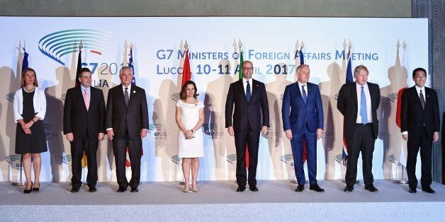 From left : EU High Representative for Foreign Affairs and Security Policy Federica Mogherini, German Foreign Minister Sigmar Gabriel, US Secretary of State Rex Tillerson, Canadian Foreign Minister Chrystia Freeland, Italy Foreign Minister Angelino Alfano, French Foreign Minister Jean-Marc Ayrault, British Foreign Secretary Boris Johnson and Japanese Foreign Minister Fumio Kishida pose for a family picture on the second day of a meeting of Foreign Affairs Ministers from the Group of Seven (G7) industrialised countries on April 11, 2017 in Lucca, Tuscany. / AFP PHOTO / Vincenzo PINTO (Photo credit should read VINCENZO PINTO/AFP/Getty Images)