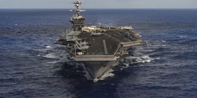 The aircraft carrier USS Carl Vinson (CVN 70) transits the Pacific Ocean January 30, 2017. U.S. Navy Photo by Mass Communication Specialist 3rd Class Tom Tonthat/Handout via Reuters ATTENTION EDITORS - THIS IMAGE WAS PROVIDED BY A THIRD PARTY. EDITORIAL USE ONLY. TPX IMAGES OF THE DAY