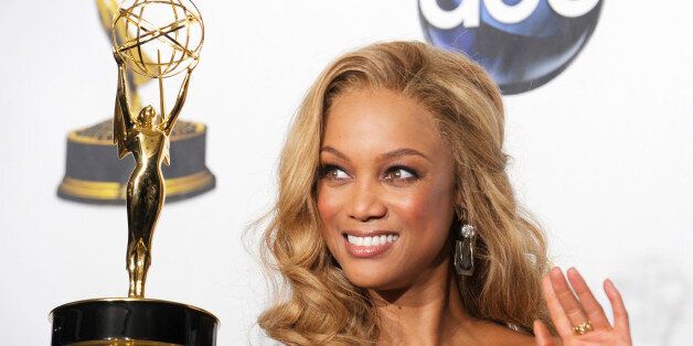 Tyra Banks poses with her award for Outstanding Talk Show/Informative for