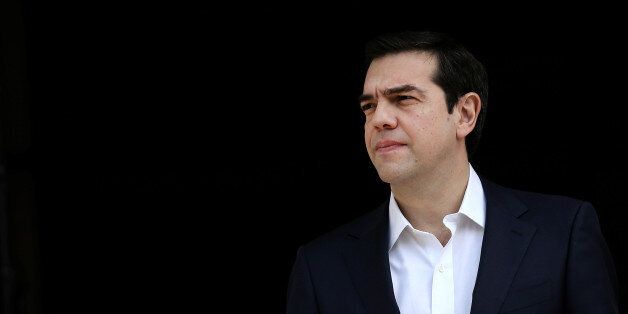 Greek Prime Minister Alexis Tsipras waits to welcome his Maltese counterpart Joseph Muscat at the Maximos Mansion in Athens, Greece March 1, 2017. REUTERS/Alkis Konstantinidis