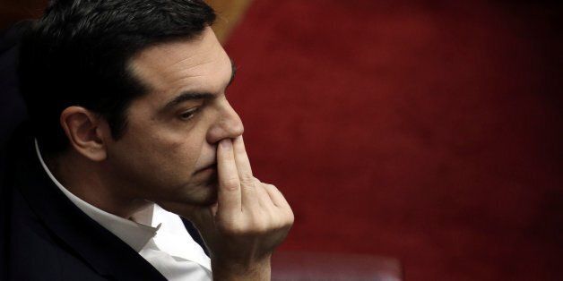Greek Prime Minister Alexis Tsipras looks on during a session for the Prime Minister's Question Time, regarding the results of the latest Eurogroup, at the parliament in Athens, Greece, February 24, 2017. REUTERS/Alkis Konstantinidis