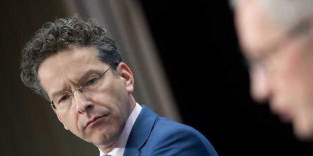 Jeroen Dijsselbloem, Dutch finance minister and head of the group of euro-area finance ministers, listens during a news conference following a Eurogroup meeting of finance ministers in Brussels, Belgium, on Monday, March 20, 2017. Wolfgang Schaeuble, Germany's finance minister, said to reporters ahead of the meeting of euro-area finance ministers We'll get a report on Greece, but the mission isn't completed. Photographer: Jasper Juinen/Bloomberg via Getty Images