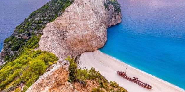Sunset at Navagio beach with shipwreck view, Zakynthos, Greece
