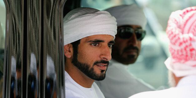 DUBAI, UNITED ARAB EMIRATES - APRIL 16: Sheikh Hamdan bin Mohammed bin Rashid Al Maktoum Crown Prince of Dubai is pictured during Al Marmoom Heritage Festival at the Al Marmoum Camel Racetrack on April 16, 2014 in Dubai, United Arab Emirates. The festival promotes the traditional sport of camel racing within the region. (Photo by Francois Nel/Getty Images)