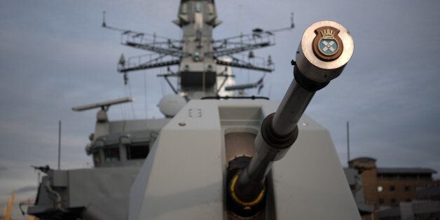 LONDON, ENGLAND - MARCH 07: The gun of HMS St Albans is pictured as the ship is moored in Canary Wharf on March 7, 2017 in London, England. HMS St Albans is a Type 23 frigate of the Royal Navy. In 2006 she took a six-month deployment to the Gulf region to protect the Iraqi oil platforms and patrol duties in the Gulf. Members of her female crew have been invited to 10 Downing Street to a reception for International Women's day hosted by the Prime Minister, Theresa May. (Photo by Carl Court/Getty Images)