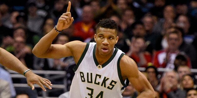 Jan 23, 2017; Milwaukee, WI, USA; Milwaukee Bucks forward Giannis Antetokounmpo (34) reacts after scoring a basket in the second quarter during the game against the Houston Rockets at BMO Harris Bradley Center. Mandatory Credit: Benny Sieu-USA TODAY Sports