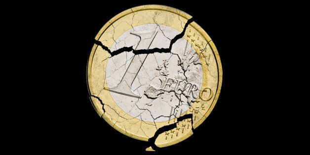 Euro coin damaged on black background