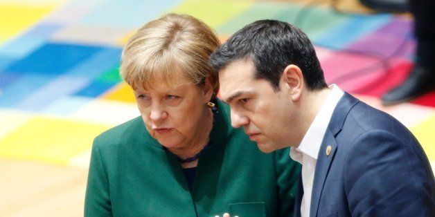 Germany's Chancellor Angela Merkel talks to Greece's Prime Minister Alexis Tsipras during a European Union leaders summit in Brussels on March 10, 2017. / AFP PHOTO / POOL / FRANCOIS LENOIR (Photo credit should read FRANCOIS LENOIR/AFP/Getty Images)
