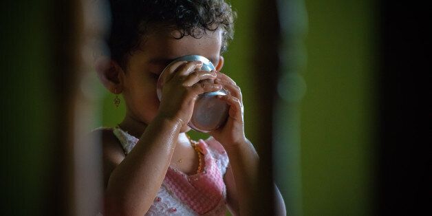 one girl, aged 2, indoor, drinking water, color