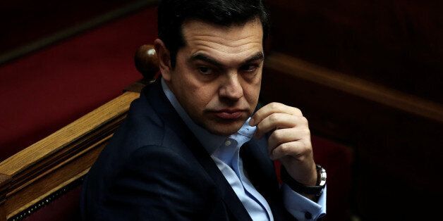 Greek Prime Minister Alexis Tsipras looks on before answering a question on corruption, during the Prime Minister's Question Time at the parliament in Athens, Greece, February 10, 2017. REUTERS/Alkis Konstantinidis