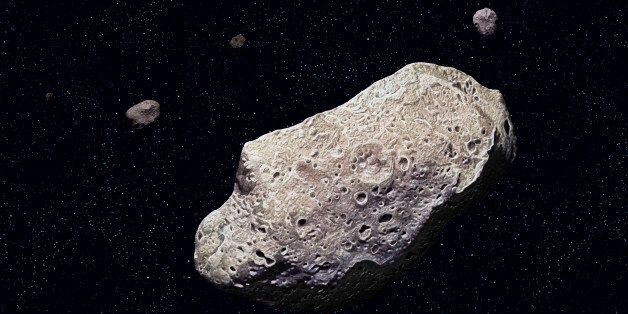 Ida, Ida, discovered by the Galileo probe in 1993, is 52 km long and has a tiny moon, Dactyl. (Photo by: QAI Publishing/UIG via Getty Images)
