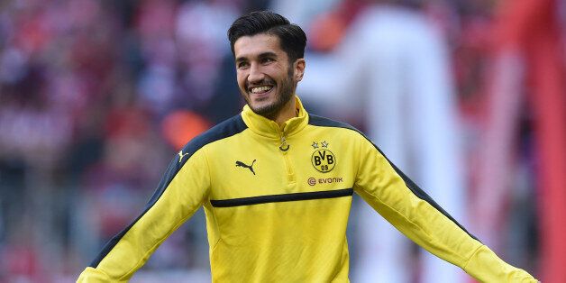 Dortmund's Turkish midfielder Nuri Sahin is pictured during the warm-up prior to the German first division Bundesliga football match FC Bayern Munich v BVB Borussia Dortmund in Munich, southern Germany, on April 8, 2017. / AFP PHOTO / Christof STACHE / RESTRICTIONS: DURING MATCH TIME: DFL RULES TO LIMIT THE ONLINE USAGE TO 15 PICTURES PER MATCH AND FORBID IMAGE SEQUENCES TO SIMULATE VIDEO. == RESTRICTED TO EDITORIAL USE == FOR FURTHER QUERIES PLEASE CONTACT DFL DIRECTLY AT + 49 69 650050 (Photo credit should read CHRISTOF STACHE/AFP/Getty Images)