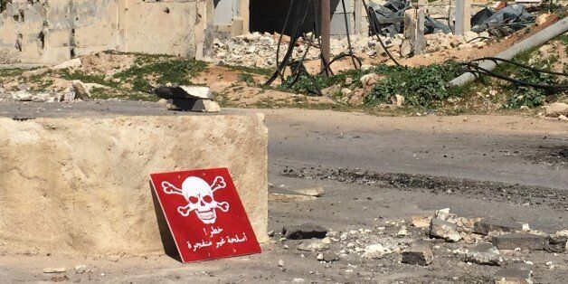 IDLIB, SYRIA - APRIL 05: A poison hazard danger sign is seen in the town of Khan Shaykun, Idlib province, Syria on April 05, 2017. On Tuesday more than 100 civilians had been killed and 500 others, mostly children, injured in Assad Regime's suspected chlorine gas attack carried out by warplanes in the town of Khan Shaykun, Idlib province. (Photo by Ogun Duru/Anadolu Agency/Getty Images)