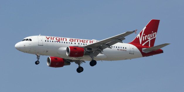 Los Angeles, California - April 19, 2014: A Virgin America Airbus A319 with the registration N526VA on approach to Los Angeles International Airport (LAX). Virgin America is a US-American low-cost airline with its headquarters near San Francisco.