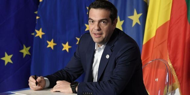 Greec's Prime Minister Alexis Tsipras signs the new Rome declaration with leaders of 27 European Union countries special during a summit of EU leaders to mark the 60th anniversary of the bloc's founding Treaty of Rome, on March 25, 2017 at Rome's Piazza del Campidoglio (Capitoline Hill). Against a backdrop of crises and in the absence of the departing Britain, the leaders signed a new Rome declaration, six decades after the six founding members signed the Treaty of Rome and gave birth to the Eu