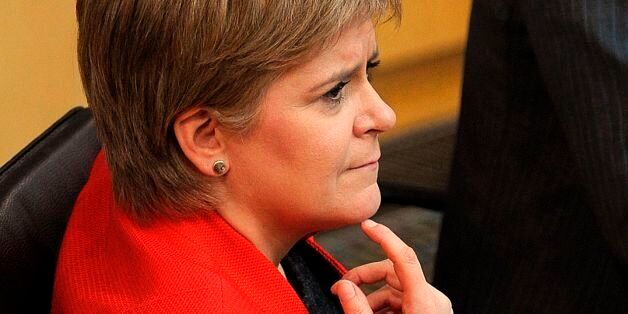 Scotland's First Minister Nicola Sturgeon listens during the first day of the 'Scotland's Choice' debate on a motion to seeking authority to request the power to hold an indpendence referendum at the Scottish Parliament in Edinburgh on March 21, 2017.Scottish lawmakers on March 21 began a two-day debate on First Minister Nicola Sturgeon's call for an independence referendum -- a major headache for Prime Minister Theresa May as she prepares to launch Brexit. / AFP PHOTO / Andy Buchanan (Photo credit should read ANDY BUCHANAN/AFP/Getty Images)