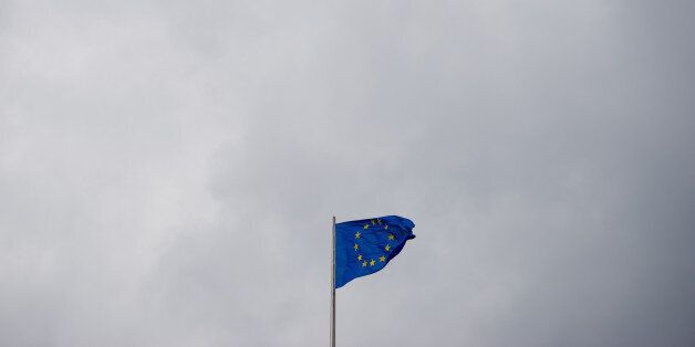 BERLIN, GERMANY - MARCH 29: The European Flag waves on top of German Bundestag on March 29, 2017 in Berlin, Germany. The UK government announced it will start the formal Brexit procedure for withdrawing from the European Union. (Photo by Steffi Loos/Getty Images)