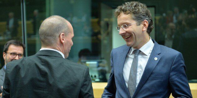 BRUSSELS, BELGIUM - JUNE 25: Greece's Finance Minister Yanis Varoufakis (L) speaks with Dutch Finance Minister and President of Eurogroup Jeroen Dijsselbloem (R) prior to a Eurogroup meeting held at EU council headquarters in Brussels, Belgium, on 25 June 2015. (Photo by Dursun Aydemir/Anadolu Agency/Getty Images)