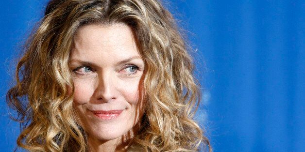 Actress Michelle Pfeiffer poses during a photocall to promote the movie 'Cheri' at the 59th Berlinale film festival in Berlin, February 10, 2009. REUTERS/Fabrizio Bensch (GERMANY)