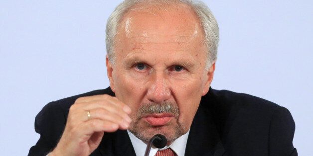 Ewald Nowotny, governor of Austria's central bank and European Central Bank (ECB) governing council member, gestures during a news conference to announce the European Central Bank's interest rate decision in Vienna, Austria, on Thursday, June 2, 2016. The European Central Bank kept its stimulus program unchanged and said it will start buying corporate bonds next week, as measures announced two months ago kick in. Photographer: Krisztian Bocsi/Bloomberg via Getty Images
