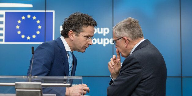 Jeroen Dijsselbloem, Dutch finance minister and head of the group of euro-area finance ministers, left, speaks to Klaus Regling, managing director of the European Stability Mechanism, during a news conference following a Eurogroup meeting of finance ministers in Brussels, Belgium, on Monday, Feb. 20, 2017. As Greek efforts to conclude a year-old review of its rescue program stall, the governments ability to regain access to the public debt market grows slimmer, increasing the possibility Athens will have to seek another unpopular strings-attached bailout program. Photographer: Jasper Juinen/Bloomberg via Getty Images