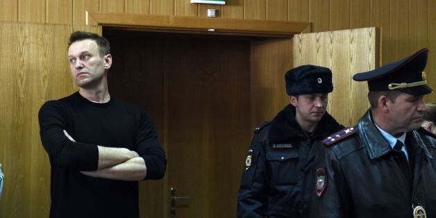 Kremlin critic Alexei Navalny, who was arrested during March 26 anti-corruption rally, attends a hearing at a court in Moscow on March 27, 2017.Russian opposition leader Alexei Navalny was sentenced to 15 days behind bars and fined Monday after he and more than 1,000 other demonstrators were detained at an anti-corruption protest in Moscow that was branded a 'provocation' by the Kremlin. / AFP PHOTO / Vasily MAXIMOV (Photo credit should read VASILY MAXIMOV/AFP/Getty Images)