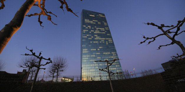 The European Central Bank (ECB) skyscraper headquarters stand illuminated at dusk in Frankfurt, Germany, on Thursday, Jan. 19, 2017. The ECB left its quantitative-easing program unchanged as policy makers wait to see if a pickup in inflation will be sustained. Photographer: Krisztian Bocsi/Bloomberg via Getty Images