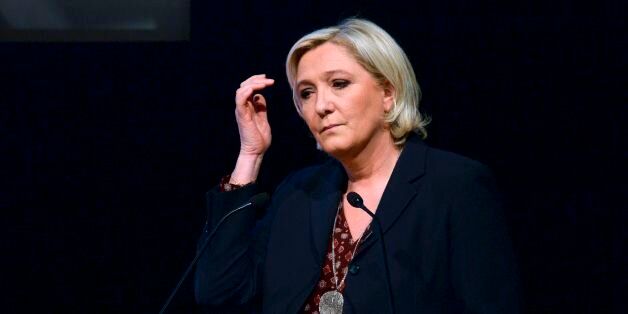 French presidential election candidate for the far-right Front National (FN) party Marine Le Pen gestures as she speaks during a meeting with French employers association Medef in Paris on March 28, 2017. / AFP PHOTO / Eric PIERMONT (Photo credit should read ERIC PIERMONT/AFP/Getty Images)