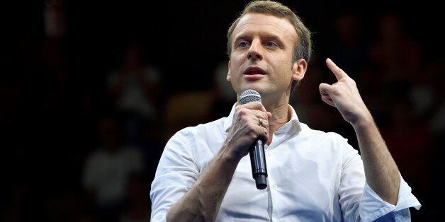 French presidential election candidate for the En Marche ! movement Emmanuel Macron delivers a speech during a campaign meeting as part of his trip to La Reunion island on March 25, 2017 in Saint-Denis. / AFP PHOTO / ERIC FEFERBERG (Photo credit should read ERIC FEFERBERG/AFP/Getty Images)