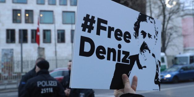 BERLIN, GERMANY - FEBRUARY 28: Protesters gather outside the Turkish Embassy to demand the release of German journalist Deniz Yucel on February 28, 2017 in Berlin, Germany. Yucel, who has both German and Turkish citizenship, is a correspondent for the German newspaper Die Welt and was arrested by Turkish authorities about two weeks ago. They accuse him of promoting propaganda for Kurdish separatists. Approximately 150 journalists are currently in prison in Turkey. (Photo by Sean Gallup/Getty Images)