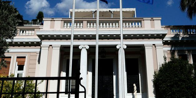 Meeting under the Prime Minister at Maximos Mansion, after the withdrawal of the IMF from the negotiations in Brussels. on Friday June 12, 2015. The Greek flag and EU flag at the Government headquarters, Maximos mansion (Photo by NurPhoto/NurPhoto via Getty Images)
