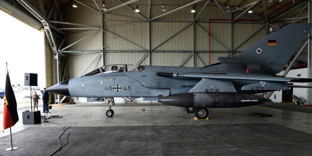A German Tornado jet is pictured in a hangar before a statement of the German and Turkish defence ministers at the air base in Incirlik, Turkey, on January 21, 2016. / AFP / POOL / TOBIAS SCHWARZ (Photo credit should read TOBIAS SCHWARZ/AFP/Getty Images)