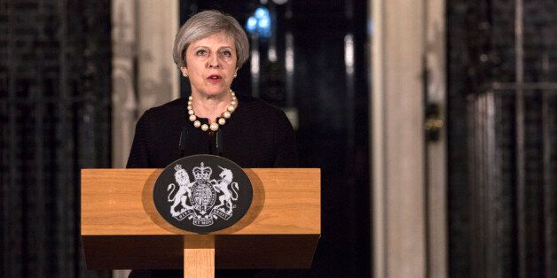 LONDON, ENGLAND - MARCH 22: Prime Minister Theresa May makes a statement in Downing street following the terrorist incident in westminster on March 22, 2017 in London, England. Four people including a police officer and his attacker have been killed in two related incidents outside the Houses of Parliament and on Westminster Bridge in what Scotland Yard are treating as a terrorist incident. (Photo by Richard Pohle - WPA Pool/Getty Images)