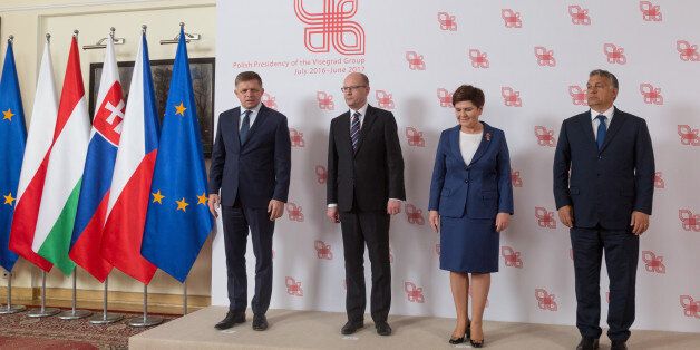 Family Photo (from the left) Prime Minister of Slovakia Robert Fico, Prime Minister of the Czech Republic Bohuslav Sobotka, Prime Minister of Poland Beata Szydlo and Prime Minister of Hungary, Viktor Orban during the meeting of heads of governments of VisegrÃ¡d Group countriesat at Chancellery of the Prime Minister in Warsaw, Poland on 21 July 2016 The Visegrad Group, also called the Visegrad Four, or V4 is an alliance of four Central European states Czech Republic, Hungary, Poland and Slovakia.The V4 focus on challenges facing the European Union in the wake of Britain's shock decision to leave the bloc.(Photo by Mateusz Wlodarczyk/NurPhoto via Getty Images)