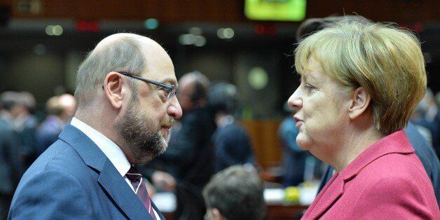 BRUSSELS, BELGIUM - MARCH 17: (R to L) German Chancellor Angela Merkel and President of European Parliament Martin Schultz talk together on the first day of two days longn European Union (EU) Summit at the Council of the European Union in Brussels, Belgium on March 17, 2016. (Photo by Dursun Aydemir/Anadolu Agency/Getty Images)