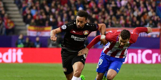 Leverkusen's midfielder Karim Bellarabi (L) vies with Atletico Madrid's French defender Lucas Hernadez during the UEFA Champions League round of 16 second leg football match Club Atletico de Madrid vs Bayer Leverkusen at the Vicente Calderon stadium in Madrid on March 15, 2017. / AFP PHOTO / PIERRE-PHILIPPE MARCOU (Photo credit should read PIERRE-PHILIPPE MARCOU/AFP/Getty Images)