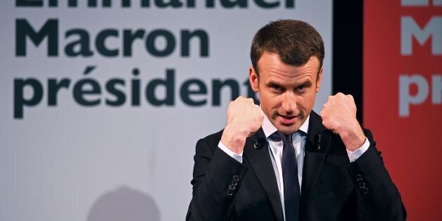 French presidential election candidate for the En Marche movement Emmanuel Macron gestures as speaks during an event organised by the collective 'Elles Marchent' (They Walk in feminine in French), during International Women's Day on March 8, 2017, in Paris. / AFP PHOTO / Eric FEFERBERG (Photo credit should read ERIC FEFERBERG/AFP/Getty Images)