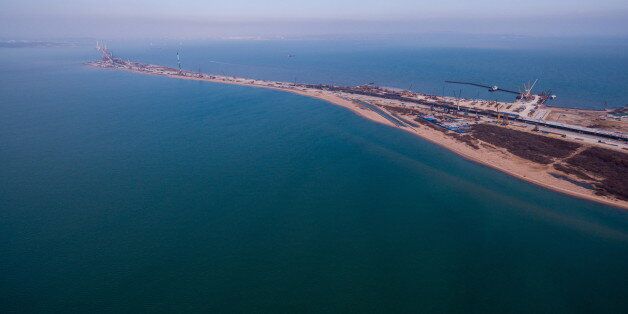 CRIMEA, RUSSIA MARCH 13, 2017: A view of the Kerch Strait Bridge under construction. The future road-rail bridge of 19 km [11.8 miles] in length is planned to link Crimea's Kerch Peninsula and mainland Russia over Tuzla Spit. Vitaly Timkiv/TASS (Photo by Vitaly Timkiv\TASS via Getty Images)