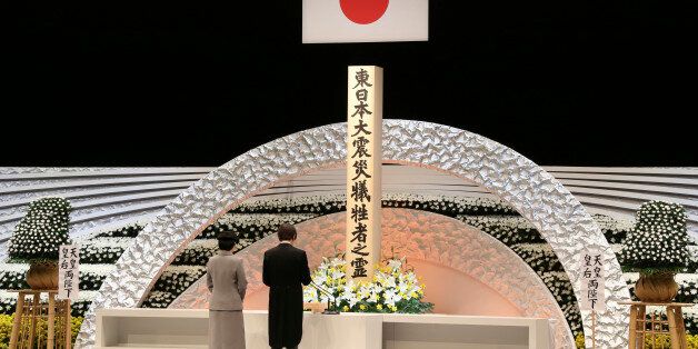Japanese Prince Akishino (R), accompanied by Princess Kiko, delivers a speech in front of the altar for the victims of the March 11, 2011 earthquake and tsunami at the national memorial service in Tokyo on March 11, 2017. Japan paused to mark six years since a deadly earthquake, tsunami and nuclear disaster devastated its northeastern coast, as more than 100,000 people remain unable or unwilling to return home. / AFP PHOTO / POOL / Koji Sasahara (Photo credit should read KOJI SASAHARA/AFP/Getty Images)