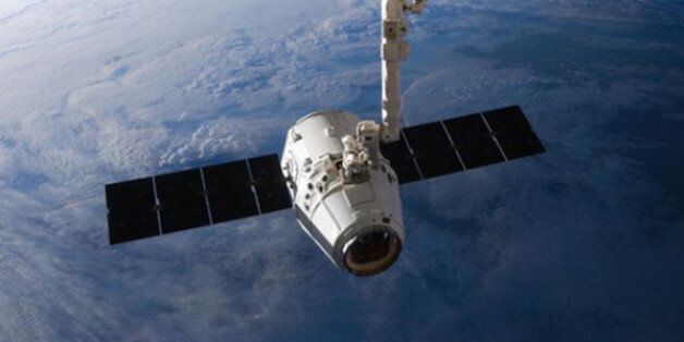 The SpaceX Dragon cargo capsule approaches the International Space Station prior to installation in this NASA picture taken April 10, 2016. REUTERS/NASA via social media/Handout via Reuters THIS IMAGE HAS BEEN SUPPLIED BY A THIRD PARTY. IT IS DISTRIBUTED, EXACTLY AS RECEIVED BY REUTERS, AS A SERVICE TO CLIENTS. FOR EDITORIAL USE ONLY. NOT FOR SALE FOR MARKETING OR ADVERTISING CAMPAIGNS