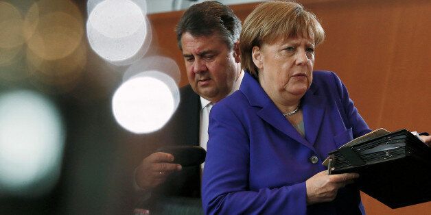 German Chancellor Angela Merkel and German Economy Minister Sigmar Gabriel attend the weekly cabinet meeting at the chancellery in Berlin, Germany, April 20, 2016. REUTERS/Hannibal Hanschke